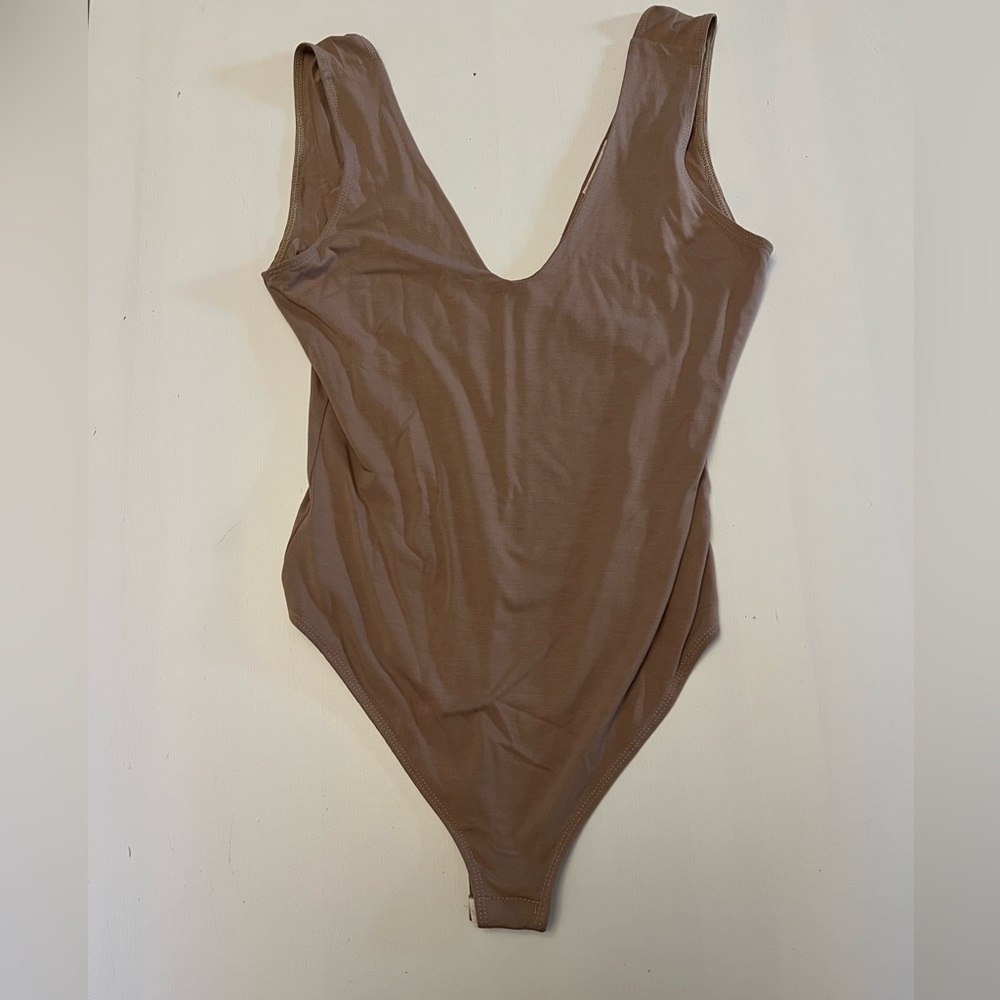 3/$15 🌺 canvas body suit